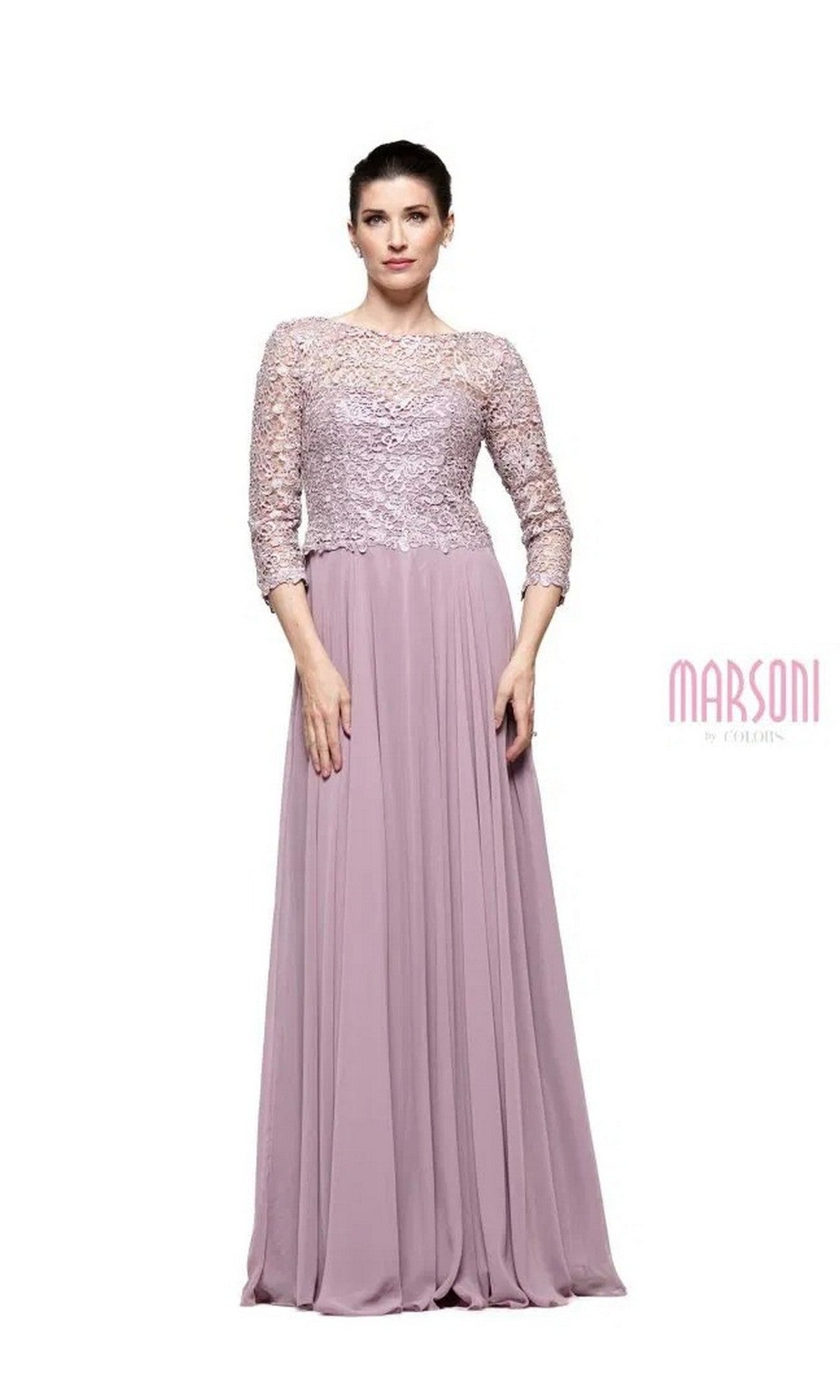 A woman stands against a white background wearing the Marsoni M223 long formal dress in mauve, featuring a lace bodice, three-quarter sleeves, and a flowing chiffon skirt.